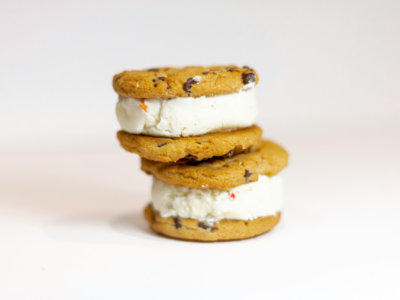 Two chocolate chip cookies filled with cream to demonstrate how content marketing and copywriting work together.