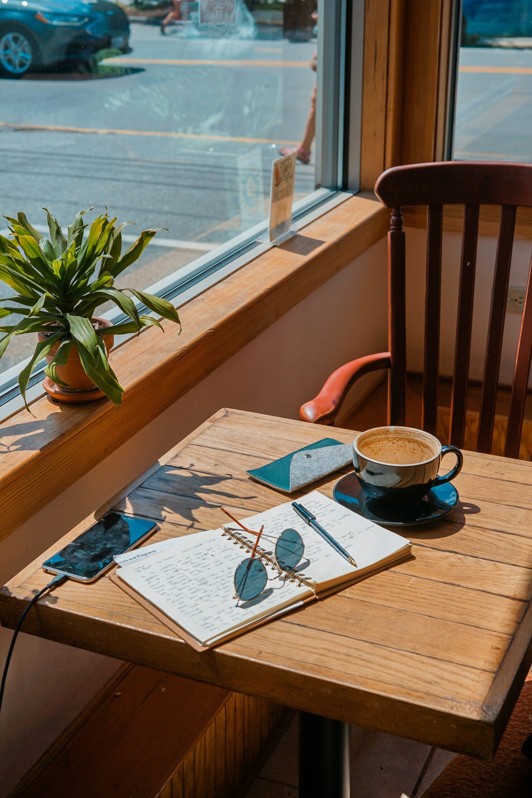 A desk in a sunny window to write and plan